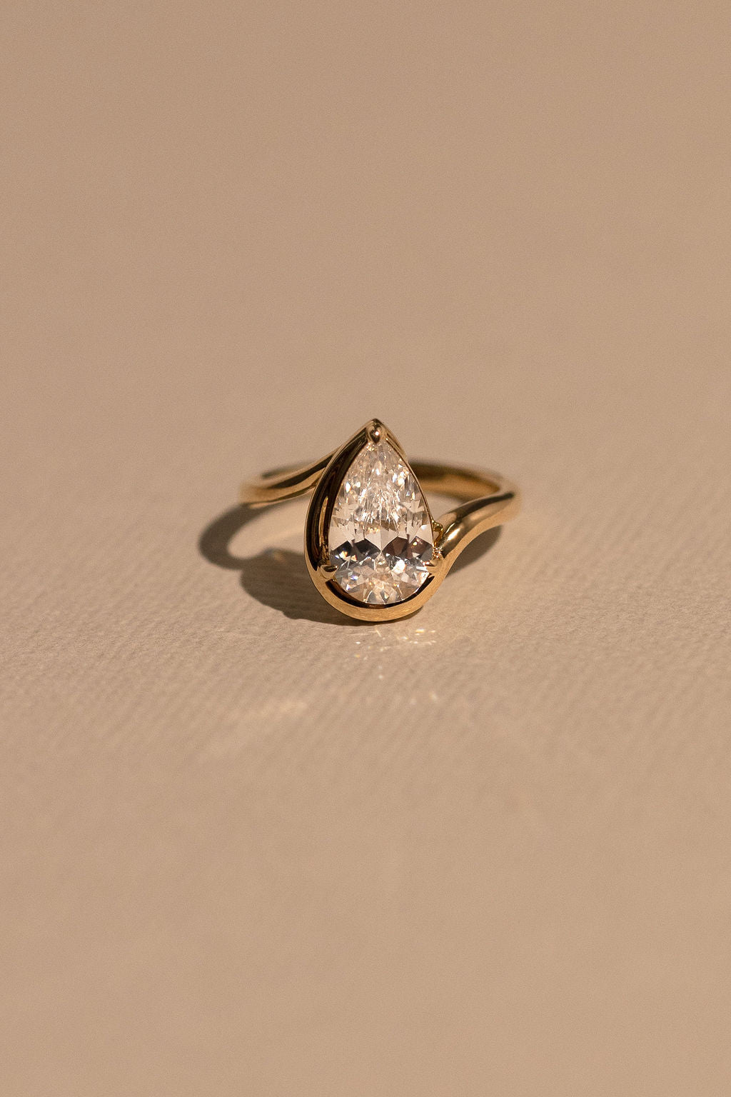 2.0CT Half Bezel Set Pear Lab Grown Diamond Bypass Engagement Ring
