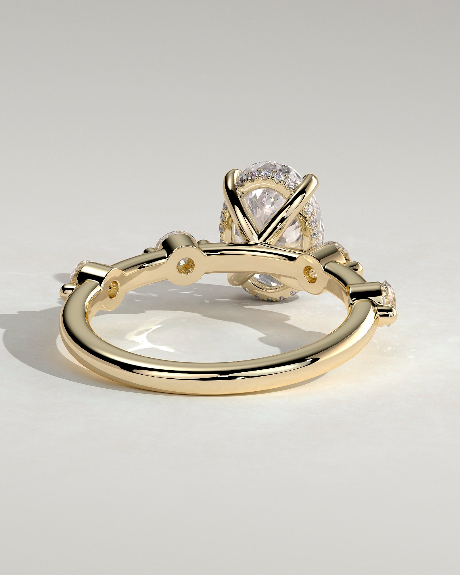 2.0CT Oval Lab Grown Diamond Hidden Halo Spaced Round Accent Engagement Ring