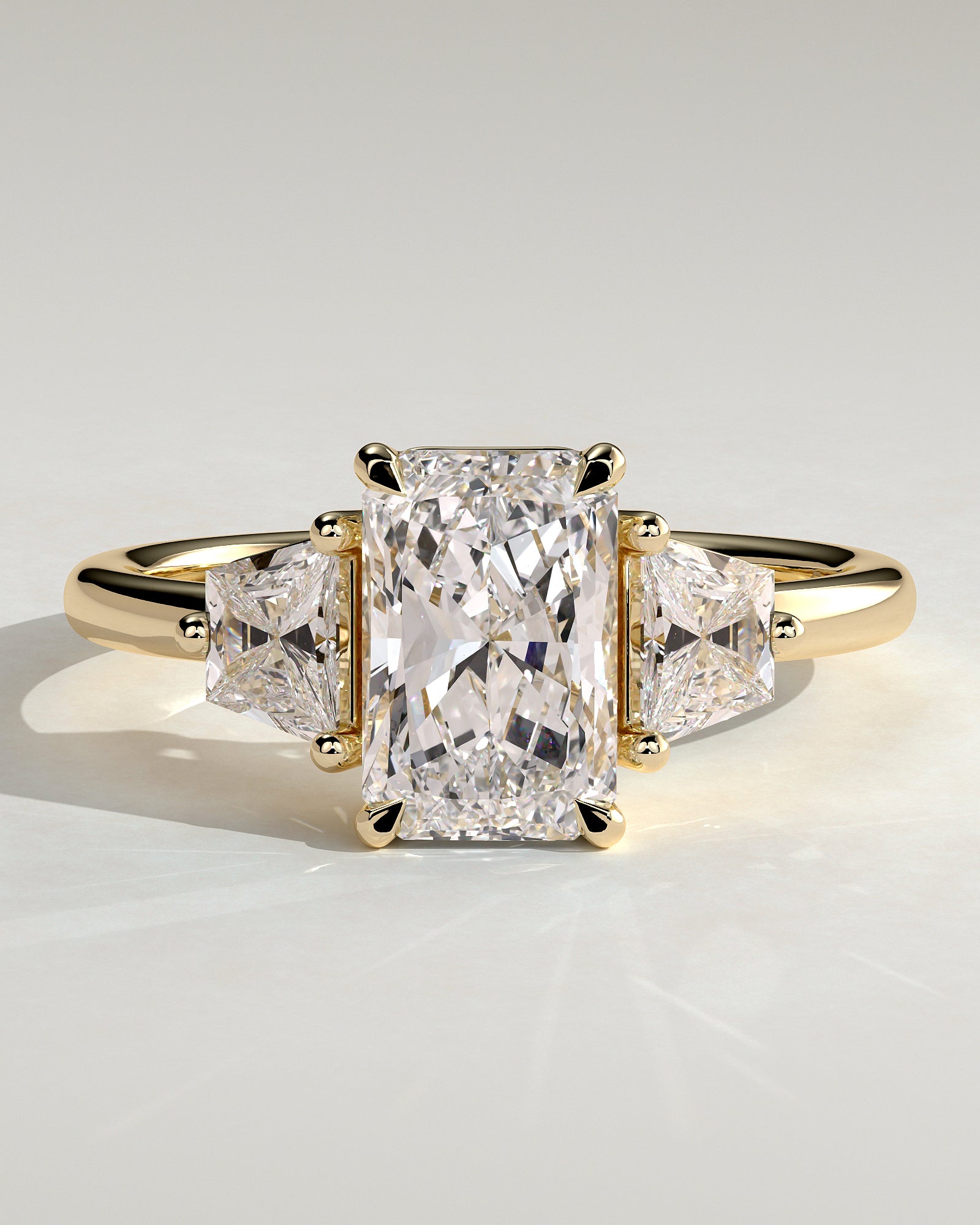 2.0CT Radiant With Trapezoid Side Stones Lab Grown Diamond Trilogy Engagement Ring