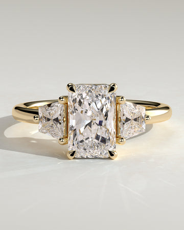 2.0CT Radiant With Trapezoid Side Stones Lab Grown Diamond Trilogy Engagement Ring