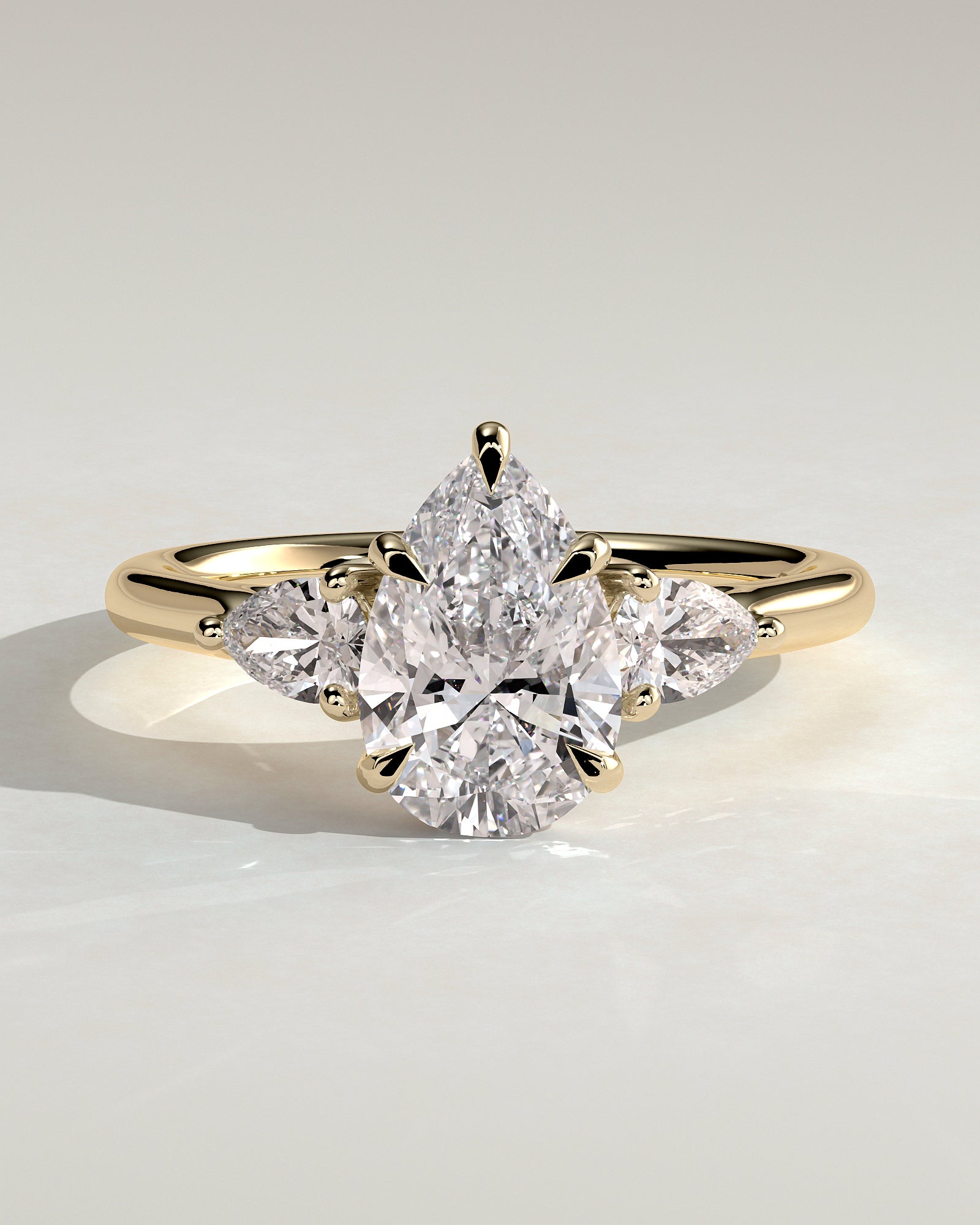 2.0CT Pear Cut Lab Grown Diamond Three Stone Engagement Ring
