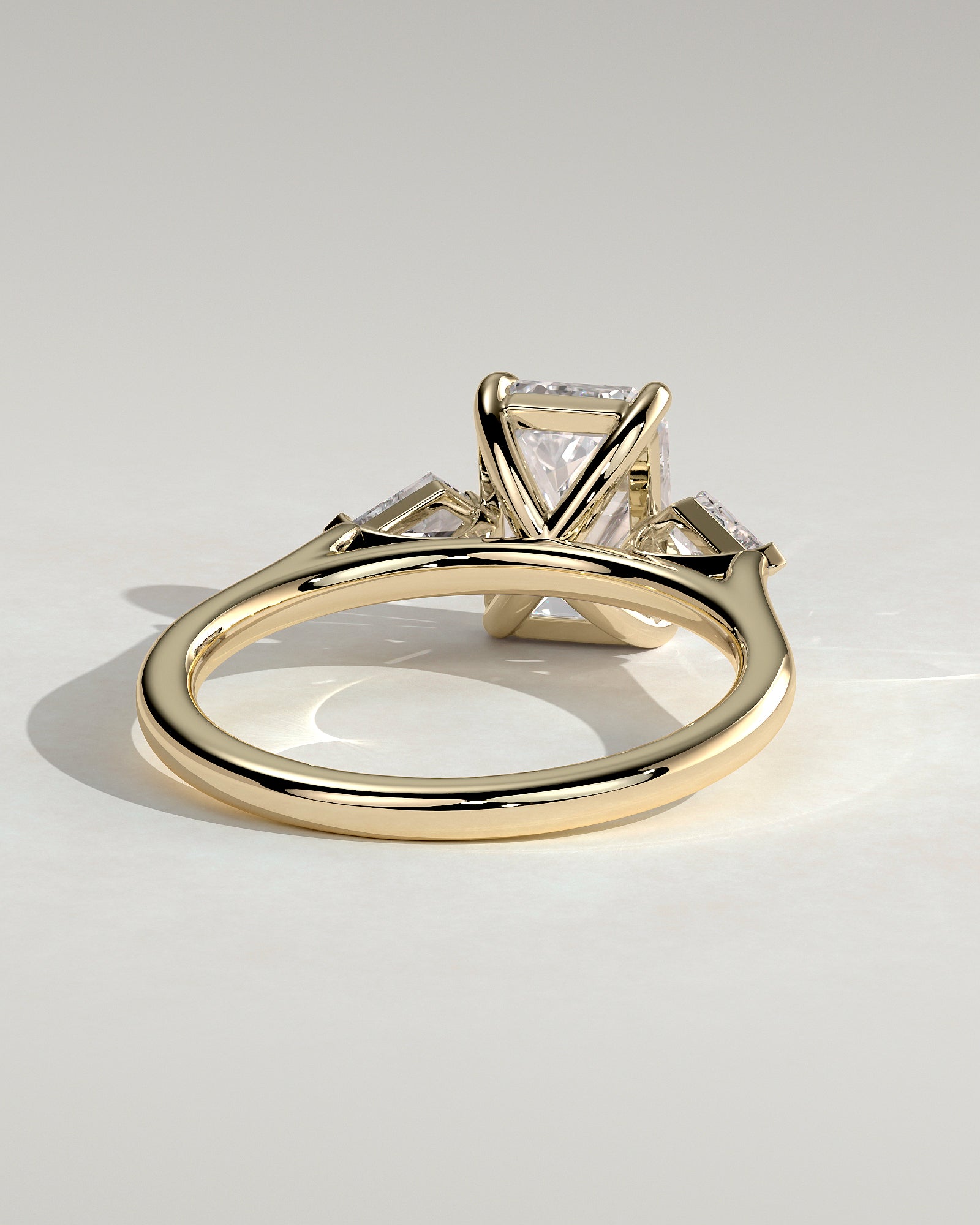 2.0CT Emerald Cut Lab Grown Diamond Trilogy With Kite Side Stones Engagement Ring