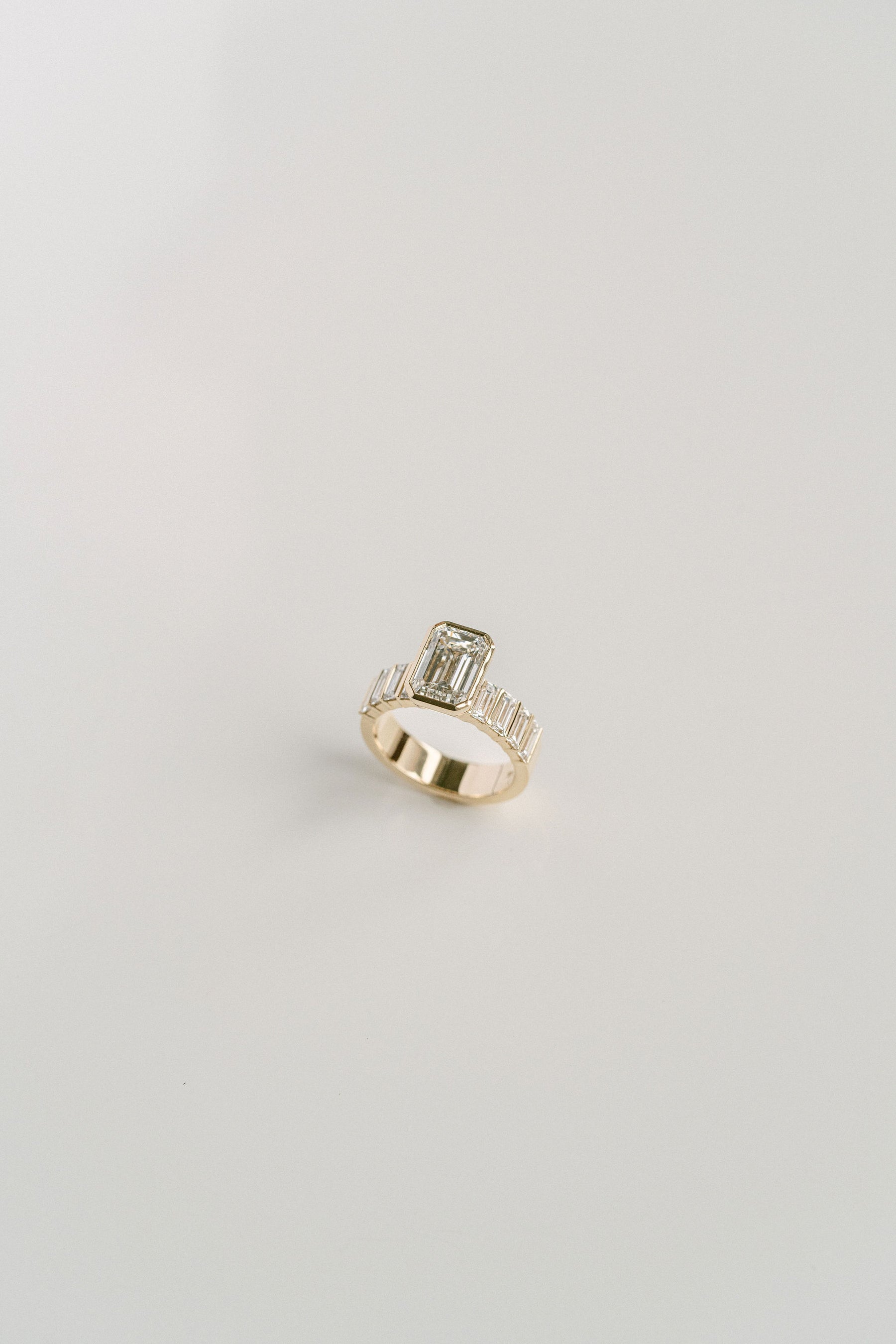 3.0CT Bezel Set Emerald Cut With Bar Set Baguette Lab Diamond 5mm Band Engagement Ring
