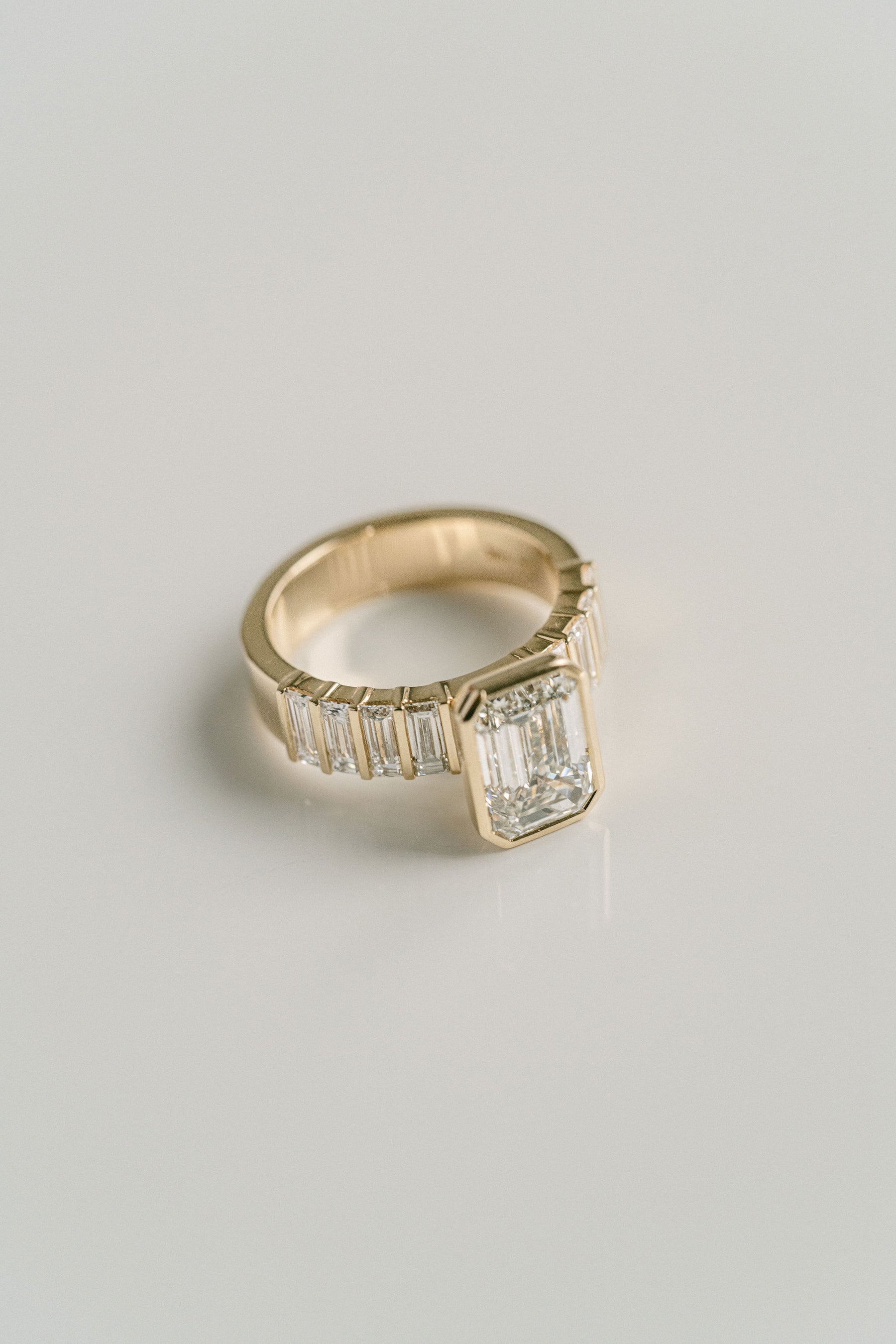3.0CT Bezel Set Emerald Cut With Bar Set Baguette Lab Diamond 5mm Band Engagement Ring