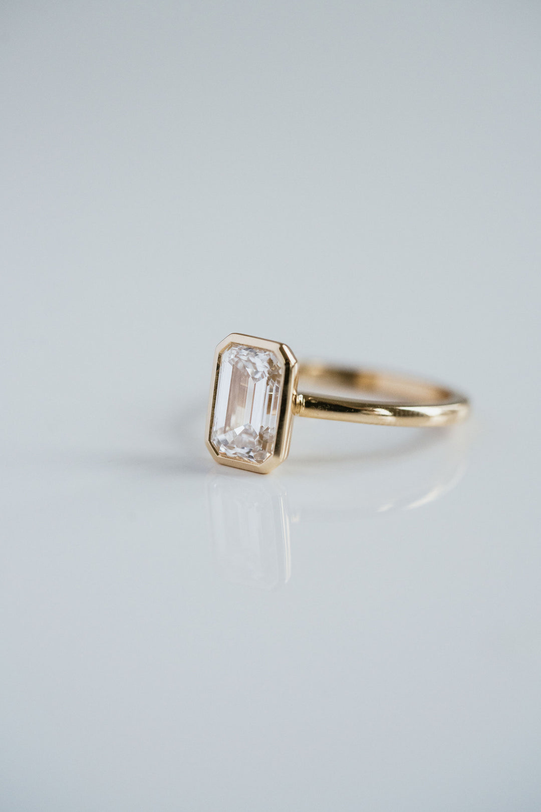 2.0CT Bezel Set Emerald Cut Lab Grown Diamond Solitaire Engagement Ring