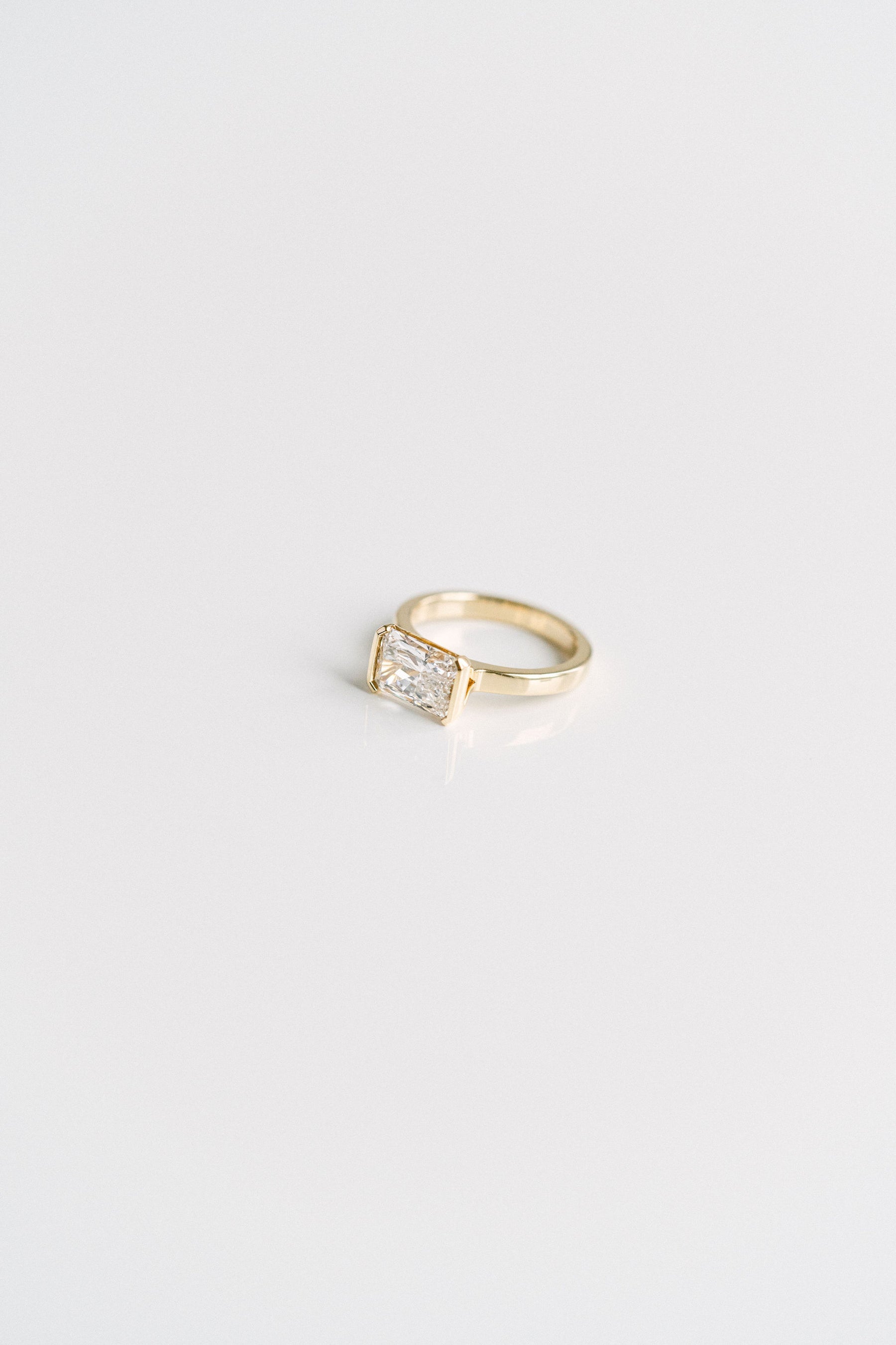 2.50CT Radiant Lab Grown Diamond East West Half Bezel Engagement Ring