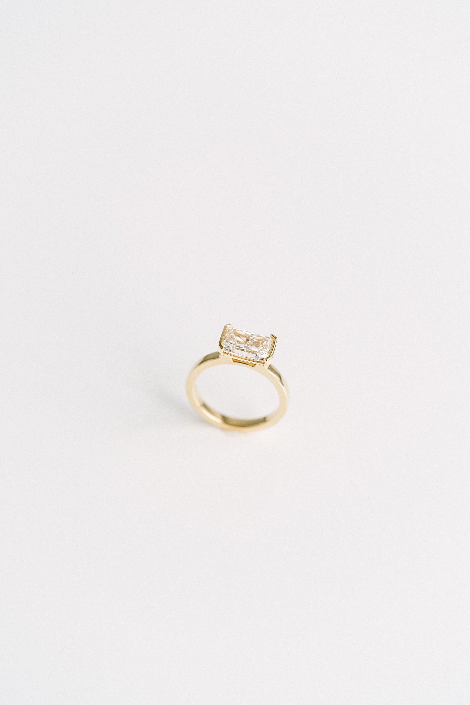 2.50CT Radiant Lab Grown Diamond East West Half Bezel Engagement Ring