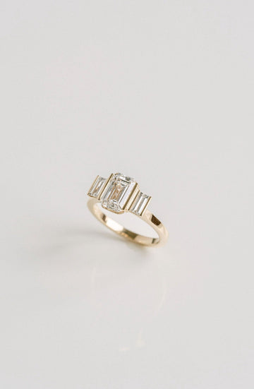 2.0CT Emerald Cut Lab Grown Diamond With Bar Set Baguette Three Stone Engagement Ring