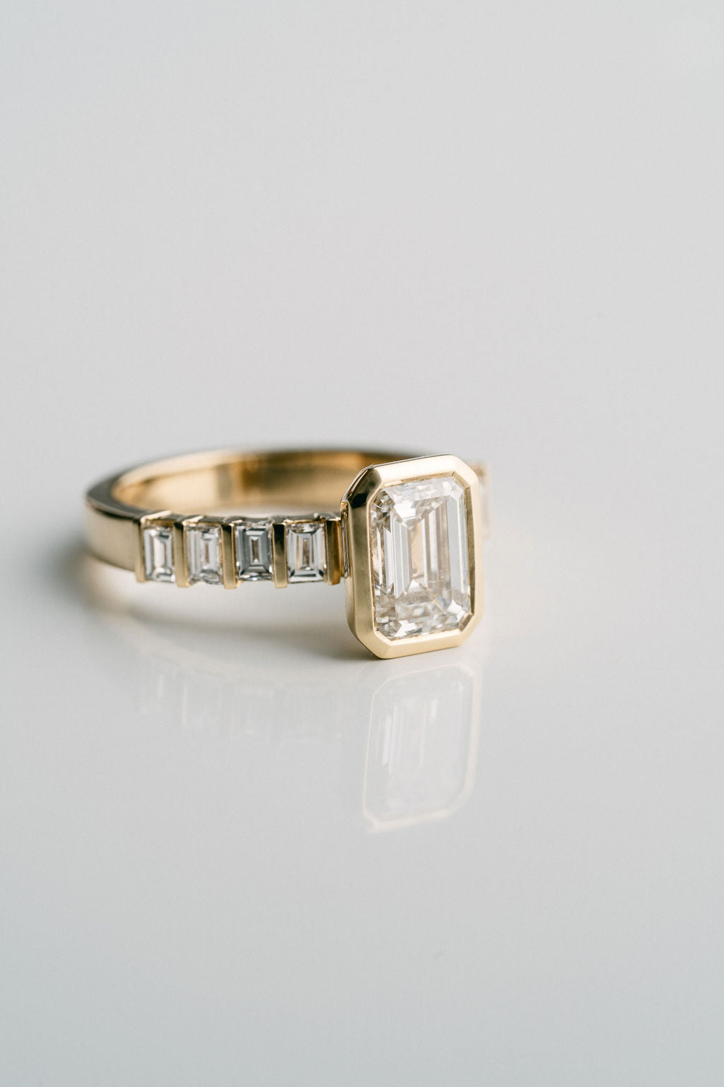2.0CT Bezel Set Emerald Cut With Bar Set Baguette Lab Diamond 3mm Band Engagement Ring