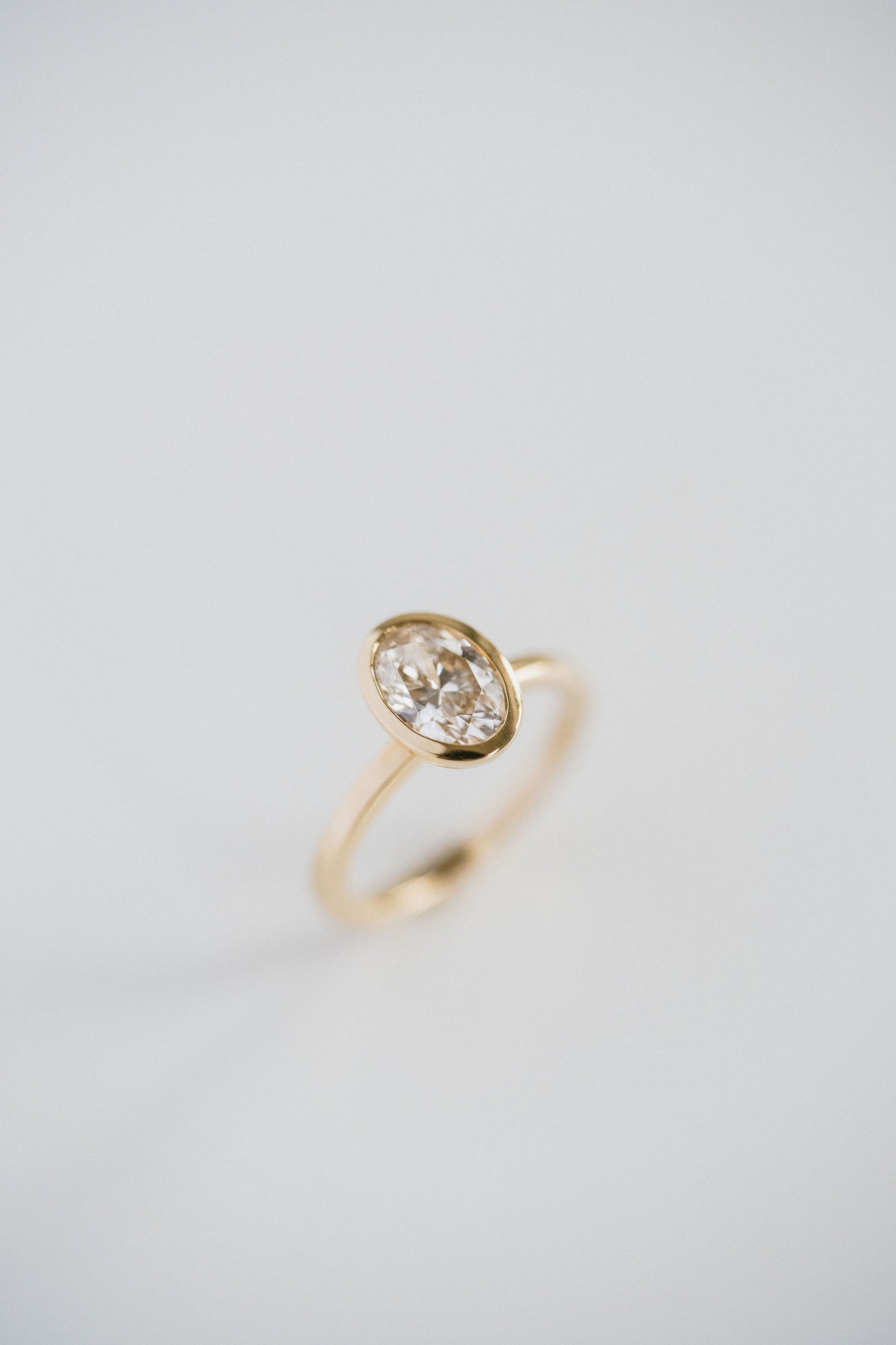 1.50CT Bezel Set Oval Lab Grown Diamond Solitaire Engagement Ring