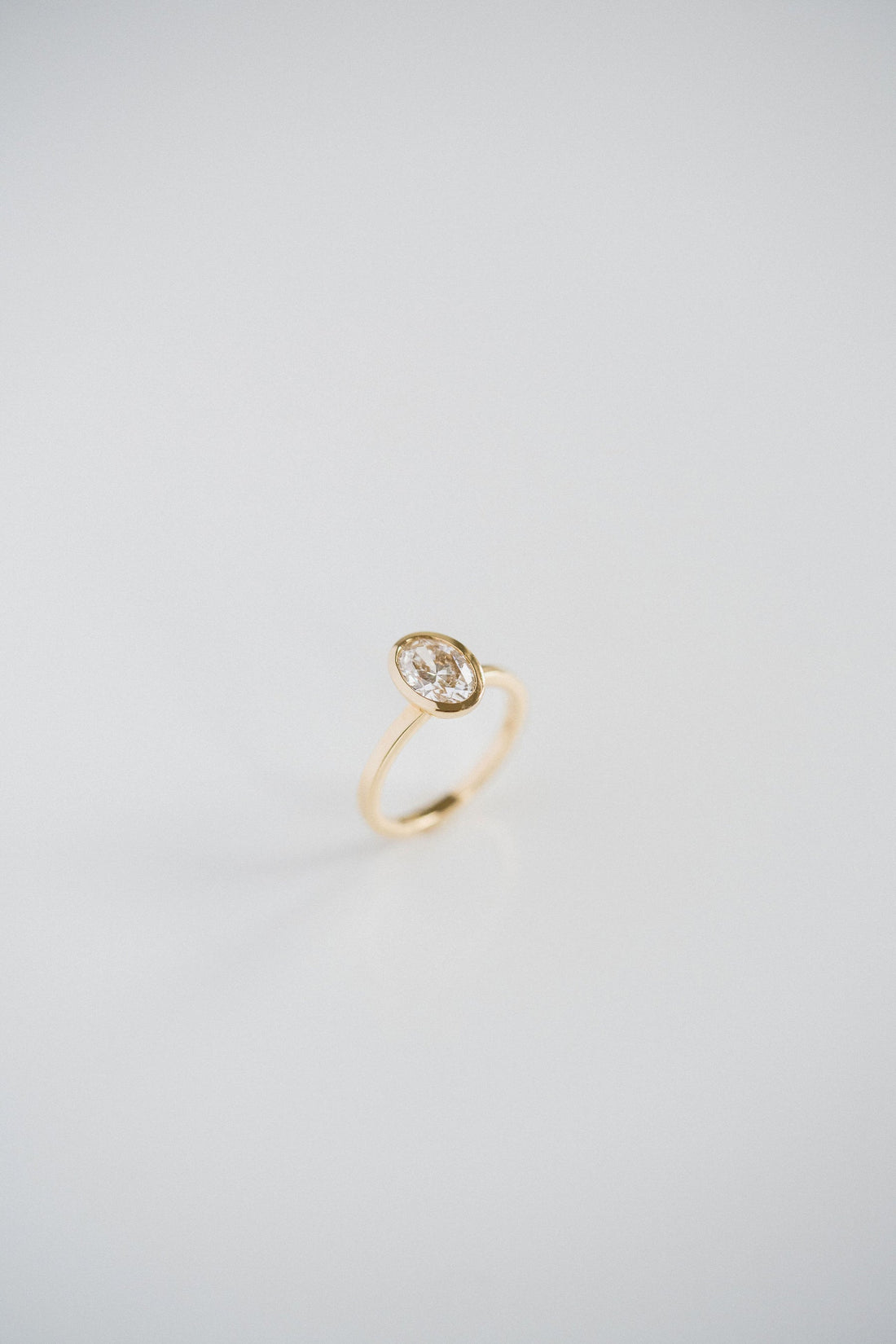 1.50CT Bezel Set Oval Lab Grown Diamond Solitaire Engagement Ring